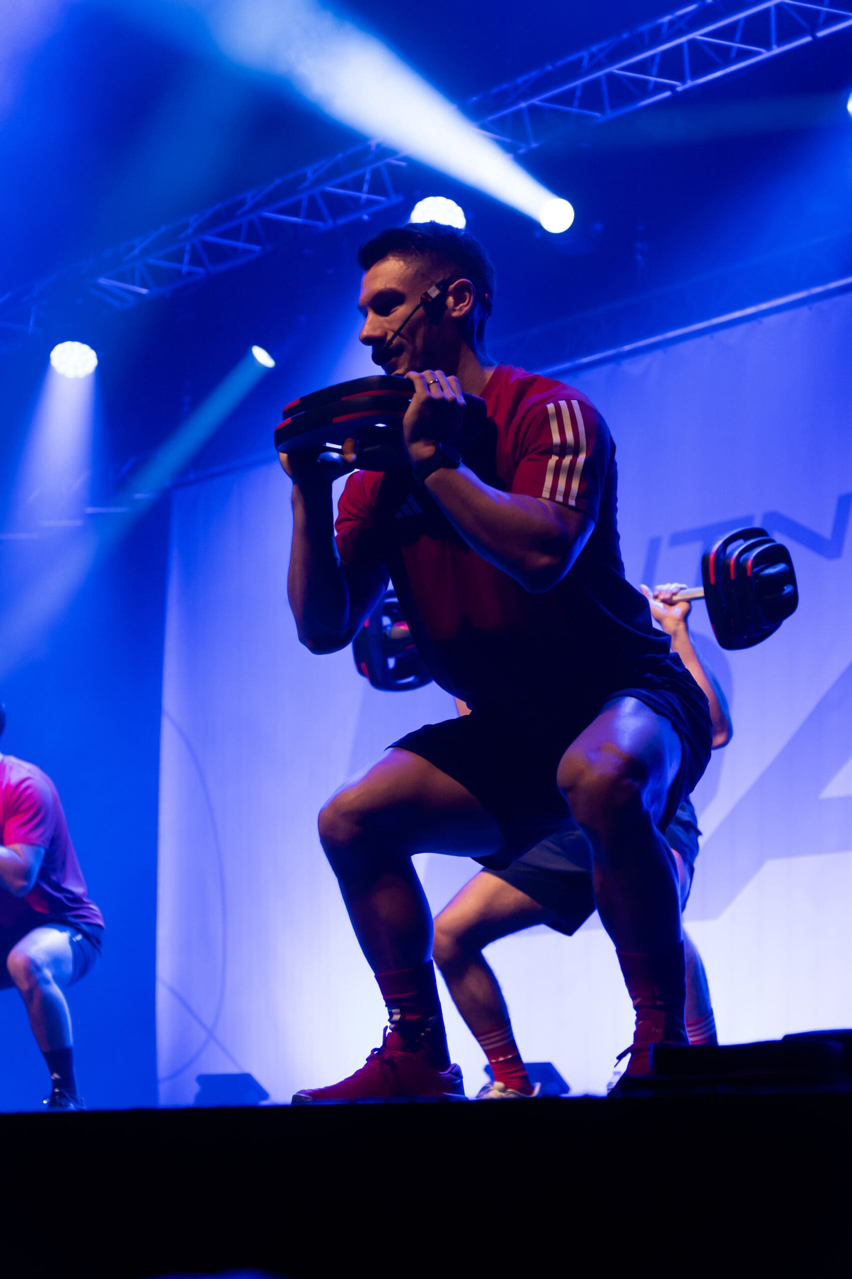 Coach Bodypump en squat avec barre au FitDay Bordeaux